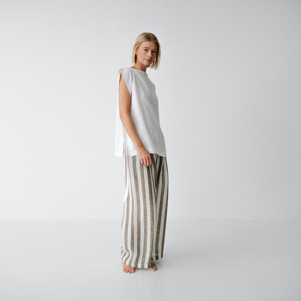 https://images.squarespace-cdn.com/content/v1/5994273337c5815907f65fce/ede0a105-fb55-4699-98f0-55fcc9db6c5f/linen-pants-brown-stripes-2.jpg?format=1500w