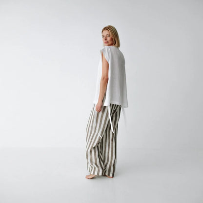 https://images.squarespace-cdn.com/content/v1/5994273337c5815907f65fce/1fef6f77-a1df-45e1-9820-41ead70ad0ed/linen-pants-brown-stripes-3.jpg?format=1500w