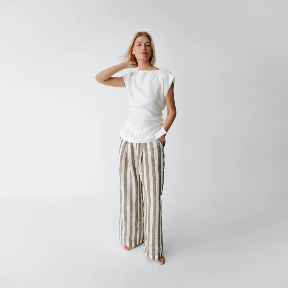 https://images.squarespace-cdn.com/content/v1/5994273337c5815907f65fce/6f11b196-0103-4def-857e-45bbad426b10/linen-pants-brown-stripes-5.jpg?format=1500w