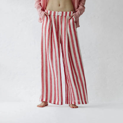 https://images.squarespace-cdn.com/content/v1/5994273337c5815907f65fce/2e7bffdd-26de-4dfd-bf70-5ec3c6bee91a/linen-pants-red-stripes-5.jpg?format=1500w
