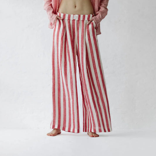 https://images.squarespace-cdn.com/content/v1/5994273337c5815907f65fce/2e7bffdd-26de-4dfd-bf70-5ec3c6bee91a/linen-pants-red-stripes-5.jpg?format=1500w