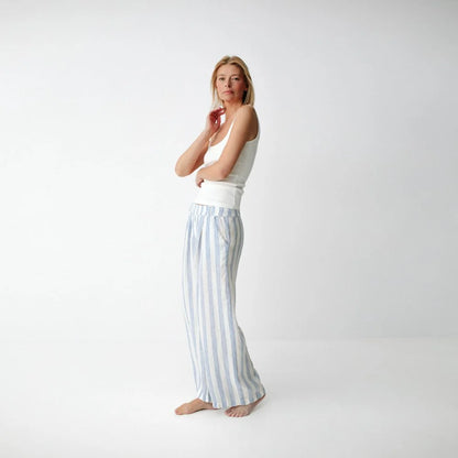 https://images.squarespace-cdn.com/content/v1/5994273337c5815907f65fce/71b09b13-c364-4370-8372-571ea90a09b3/linen-pants-stripes-blue-5.jpg?format=2500w